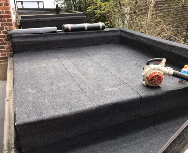 how many layers of felt on a flat roof