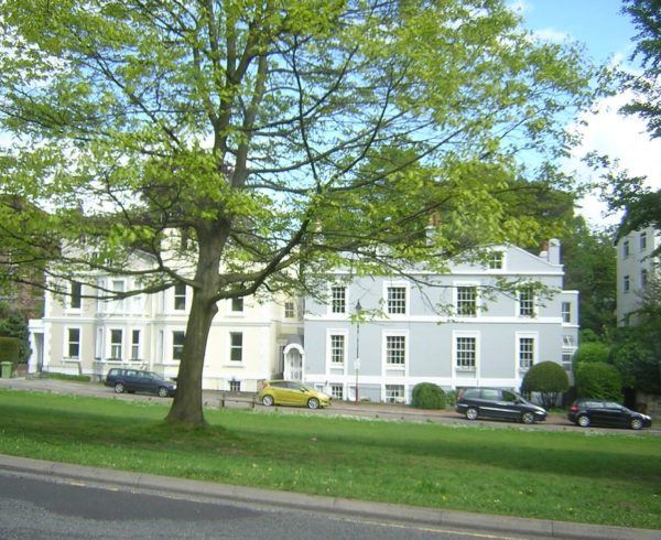 Period houses with multi-pane sash windows on London Road, Royal Tunbridge Wells